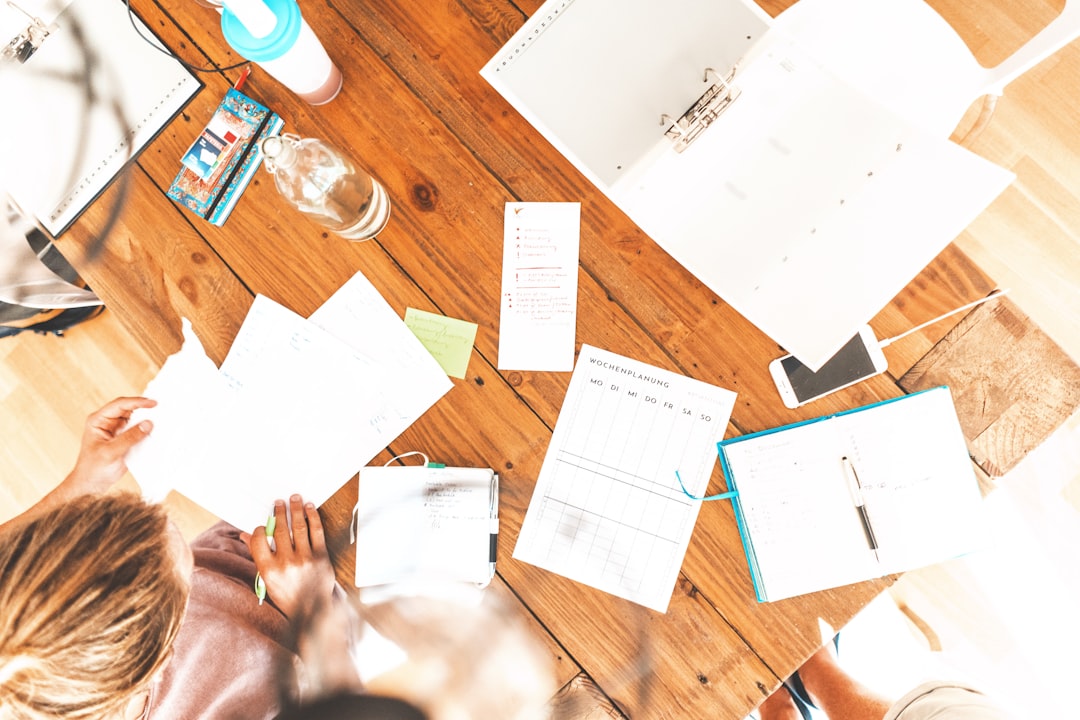 Small business website editing workspace with polished product photos ready for web upload