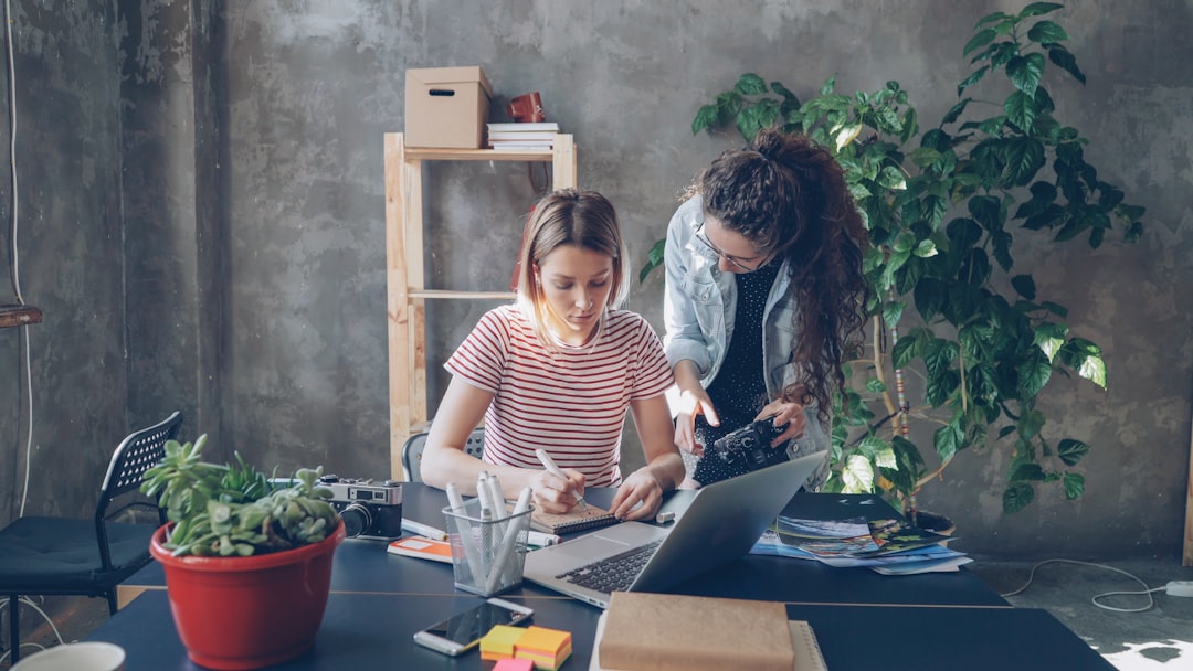 Engineers reviewing AI coding tasks with test status and planning notes