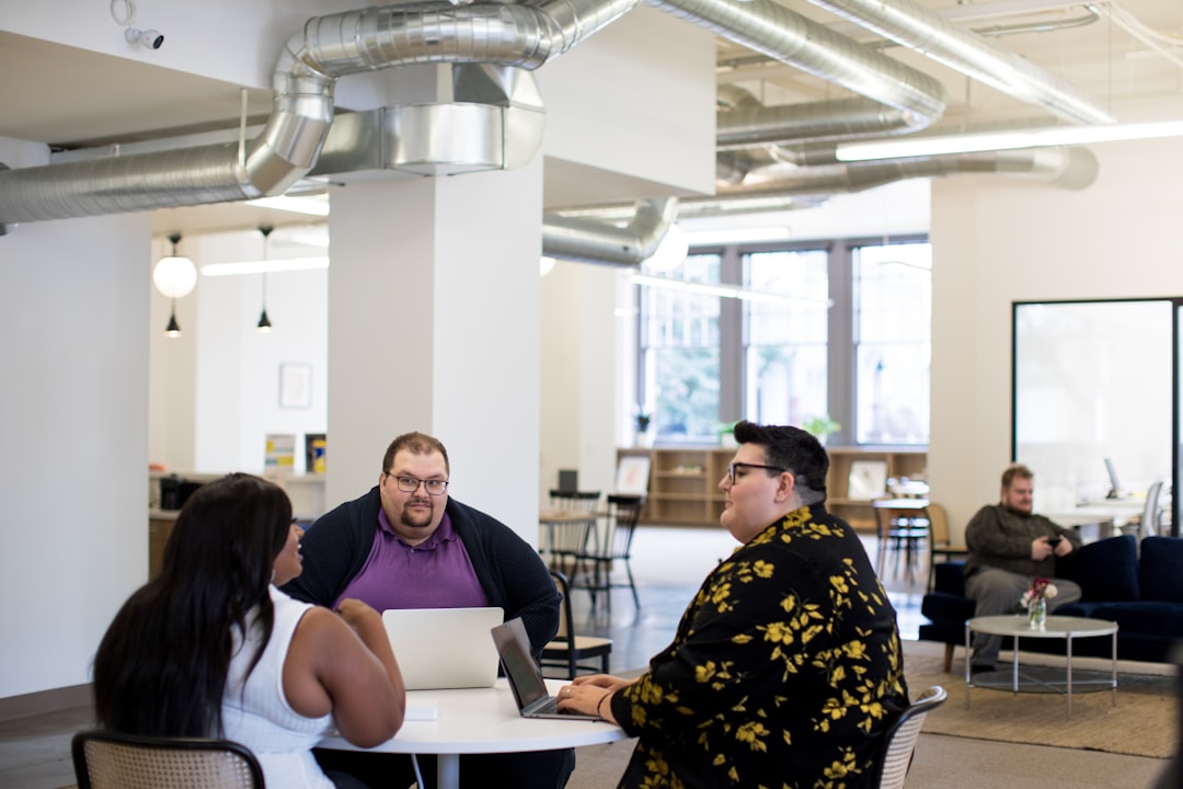 Software team reviewing AI coding recommendations in a collaborative workspace