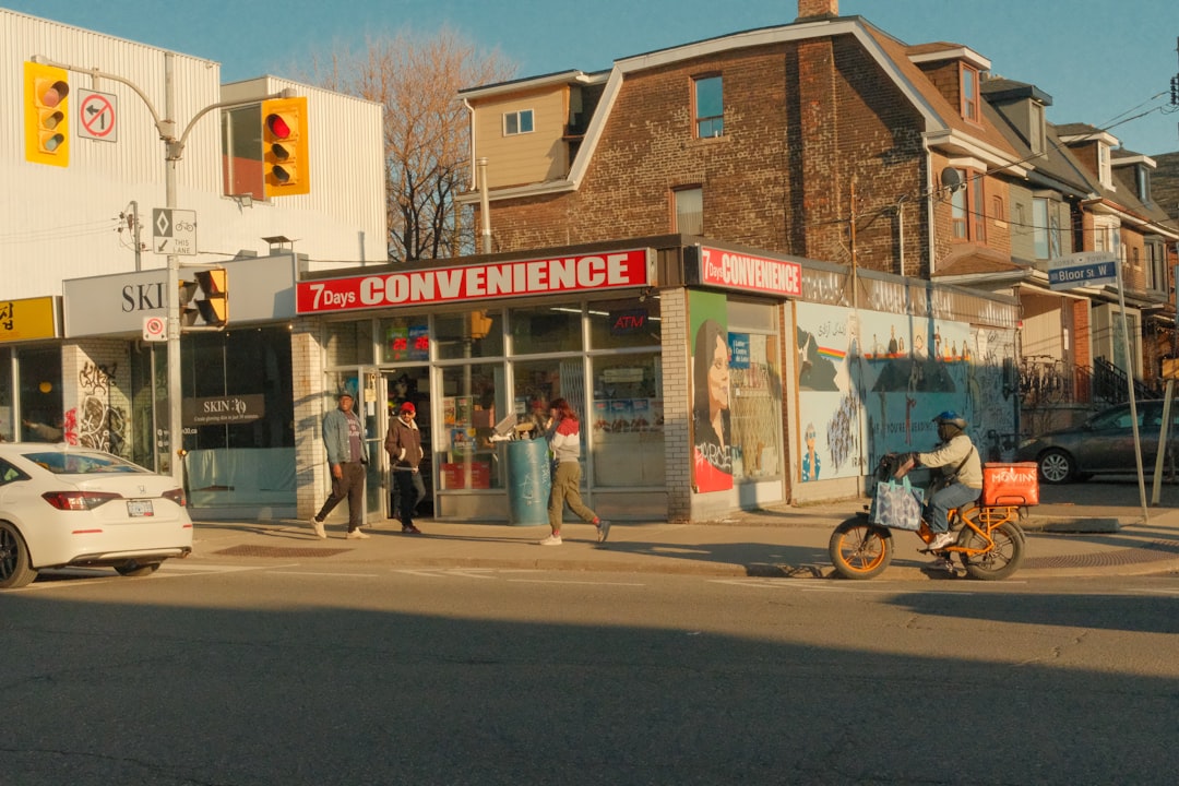 Small business owner reviewing storefront and service photos before improving them for online profiles