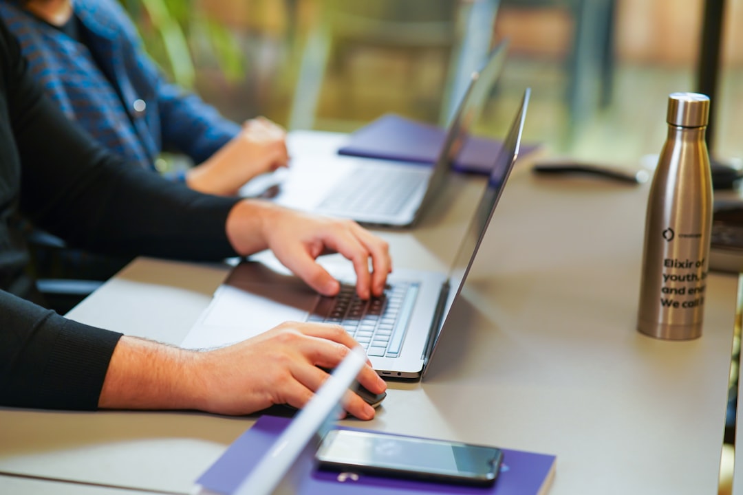 Team reviewing an AI-assisted feature plan at a modern office desk