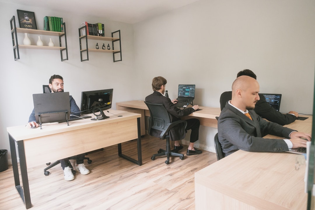 Team meeting around an AI API gateway control dashboard