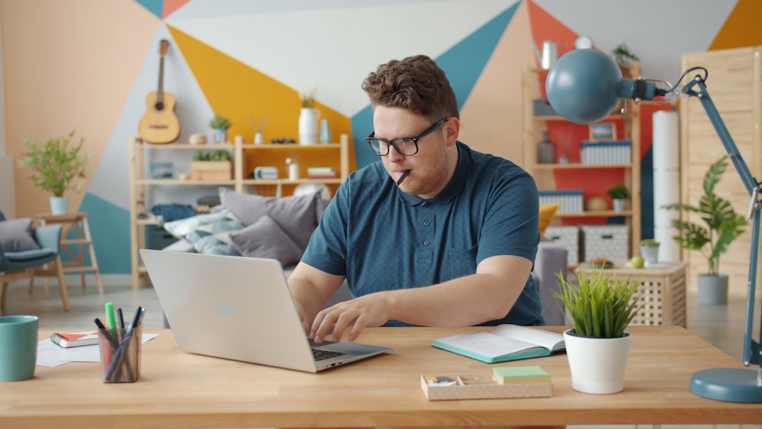 A developer reviewing browser automation results and local files on a workspace desk