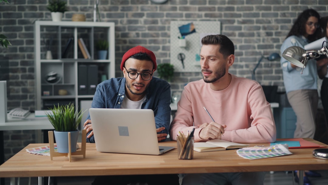 Creative team reviewing AI-generated video clips at a desk