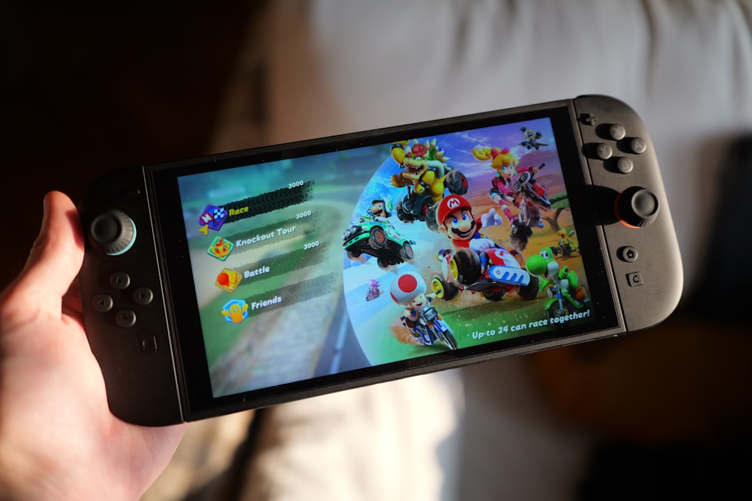 Gaming desk close to a Nintendo Switch 2 setup with a fantasy RPG screen during launch planning