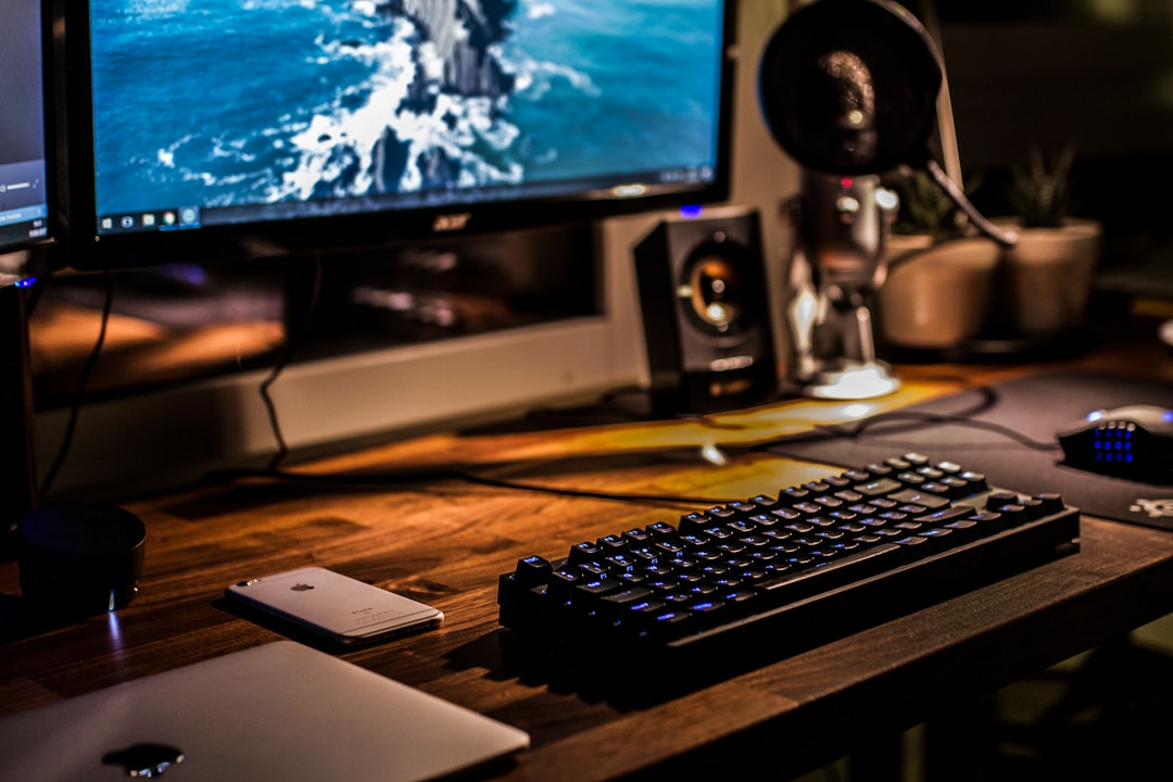 Steam Deck OLED on a desk with a handwritten budget note