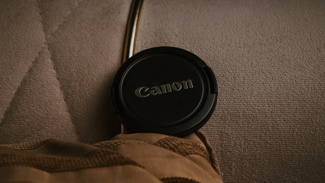 Car armrest organizer with cup holders and road trip essentials arranged in a tidy vehicle interior.