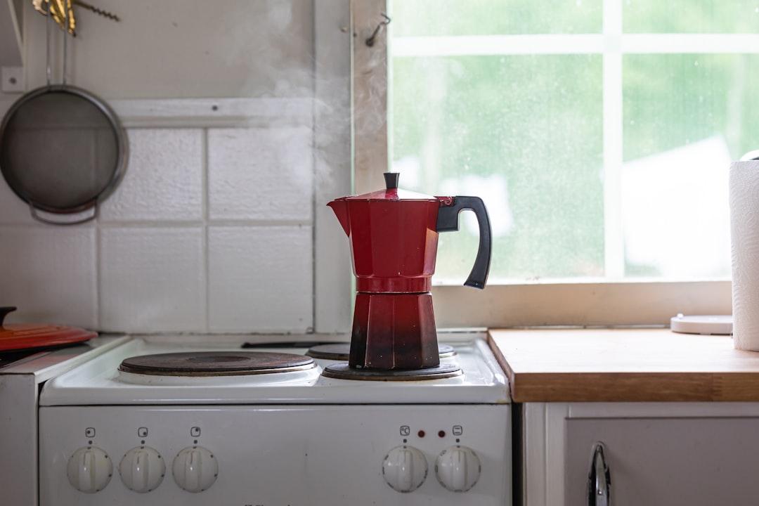 Compact kitchen counter set for hot chocolate service with hot chocolate maker and milk steamer